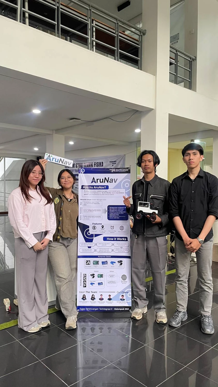 The team with the AruNav poster and prototype, from the Integrated Design II course